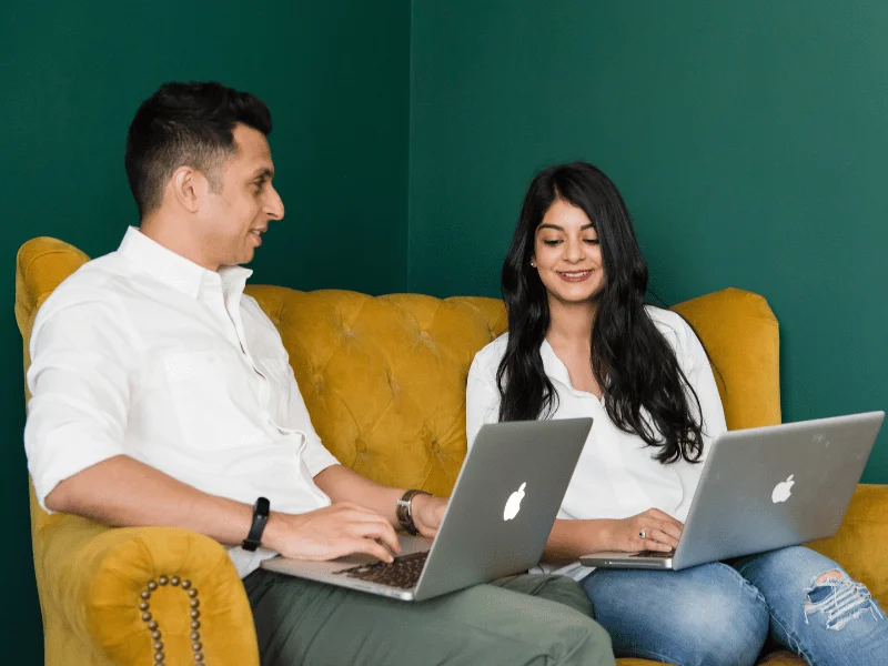 Naeem and Alina working on Mac inside